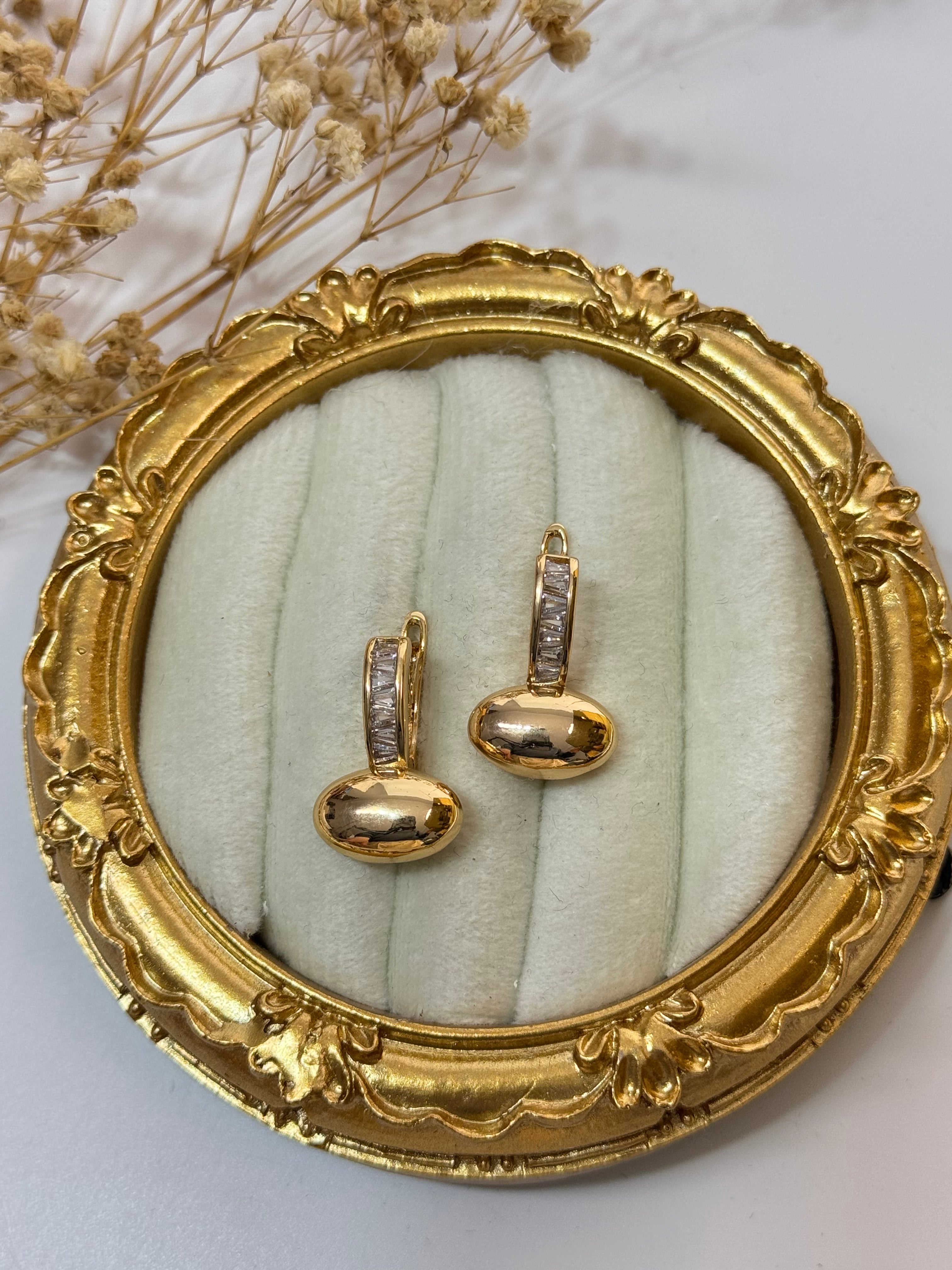 İTHAL ELİPS DETAYLI GOLD KÜPE