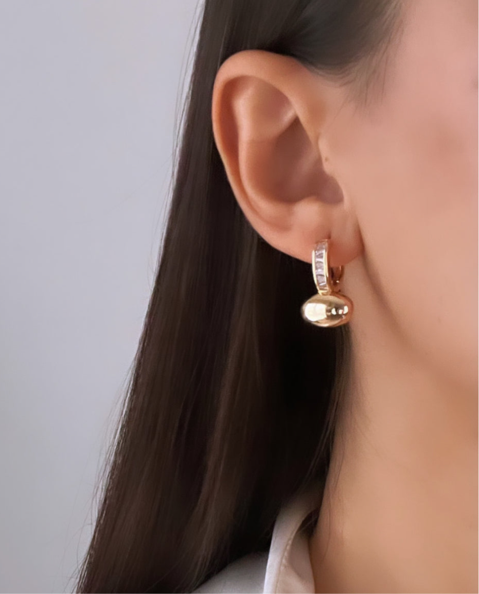 İTHAL ELİPS DETAYLI GOLD KÜPE