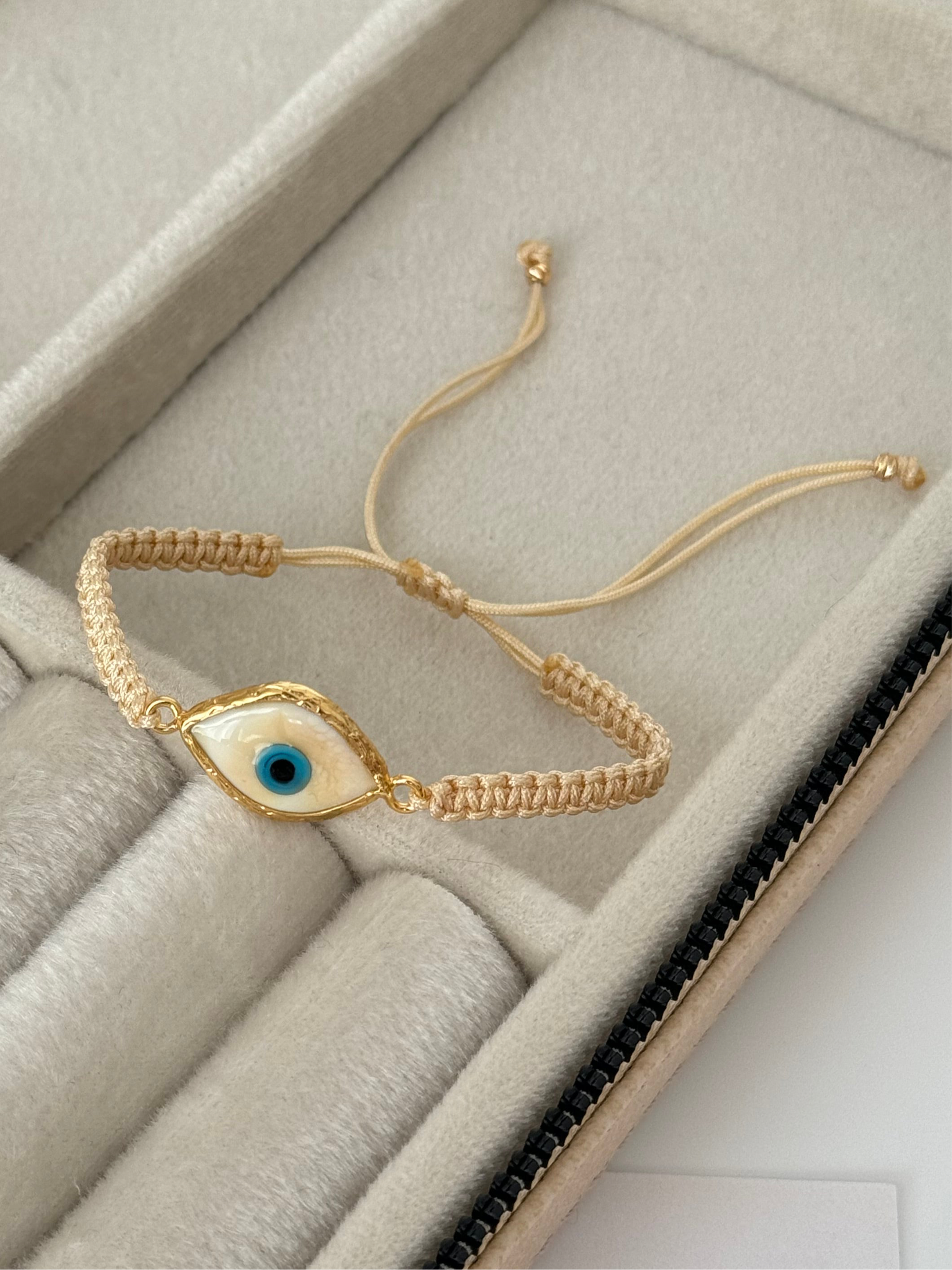ENA KREM CAM NAZAR BONCUKLU ALTIN KAPLAMA DETAYLI İPLİ BİLEKLİK