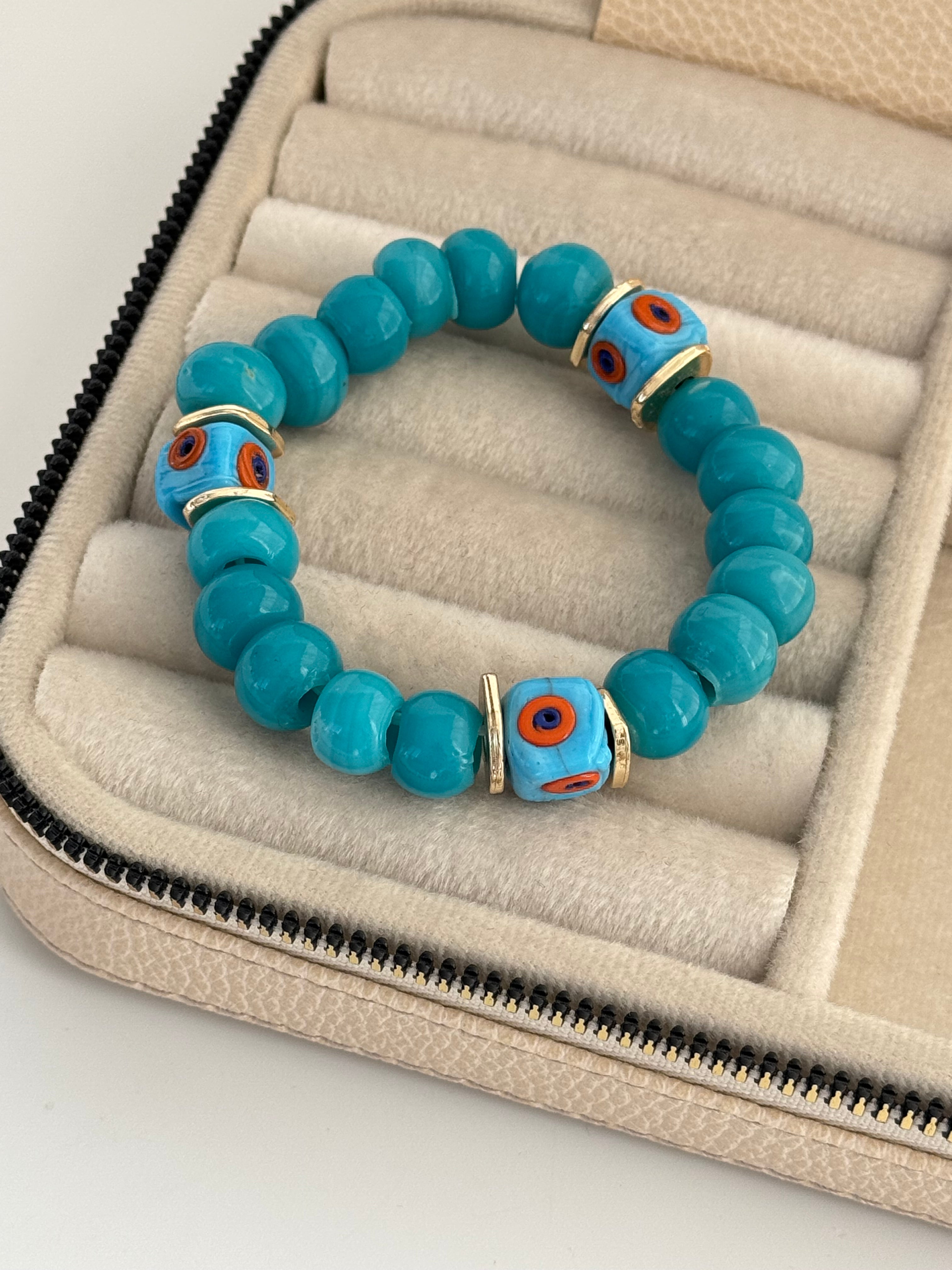 ŞİVA NAZAR BONCUK DETAYLI DOĞAL TAŞLI ALTIN KAPLAMA LASTİK BİLEKLİK