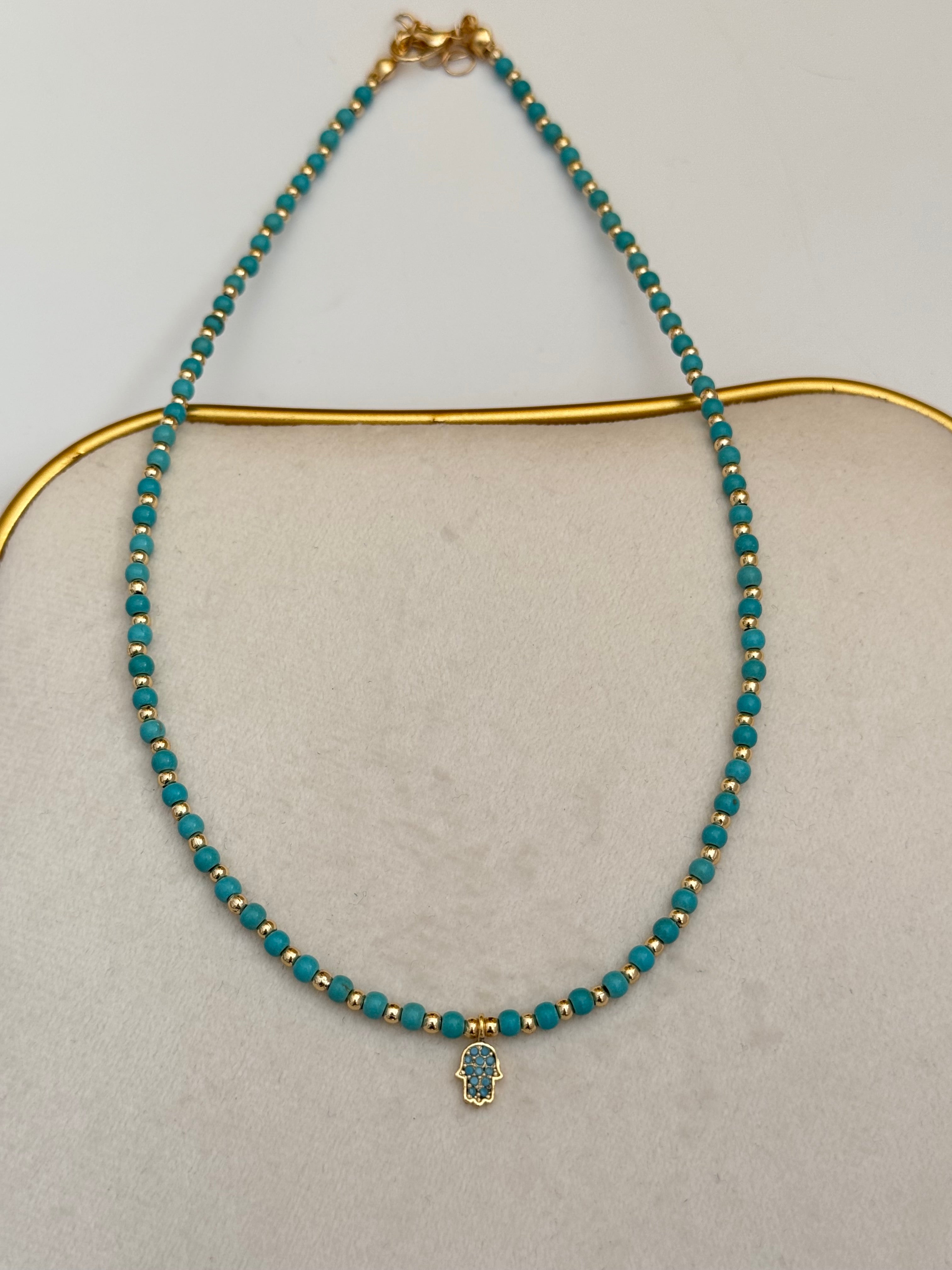 SUNA FATİMA ANA ELİ MAVİ BONCUKLU ALTIN KAPLAMA DETAYLI KOLYE