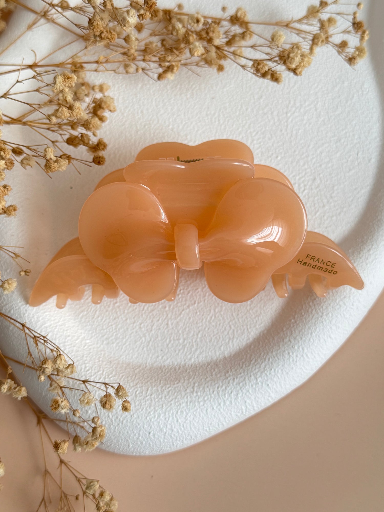 İTHAL ÇİÇEK DETAYLI SOMON RENK KEMİK MANDAL TOKA