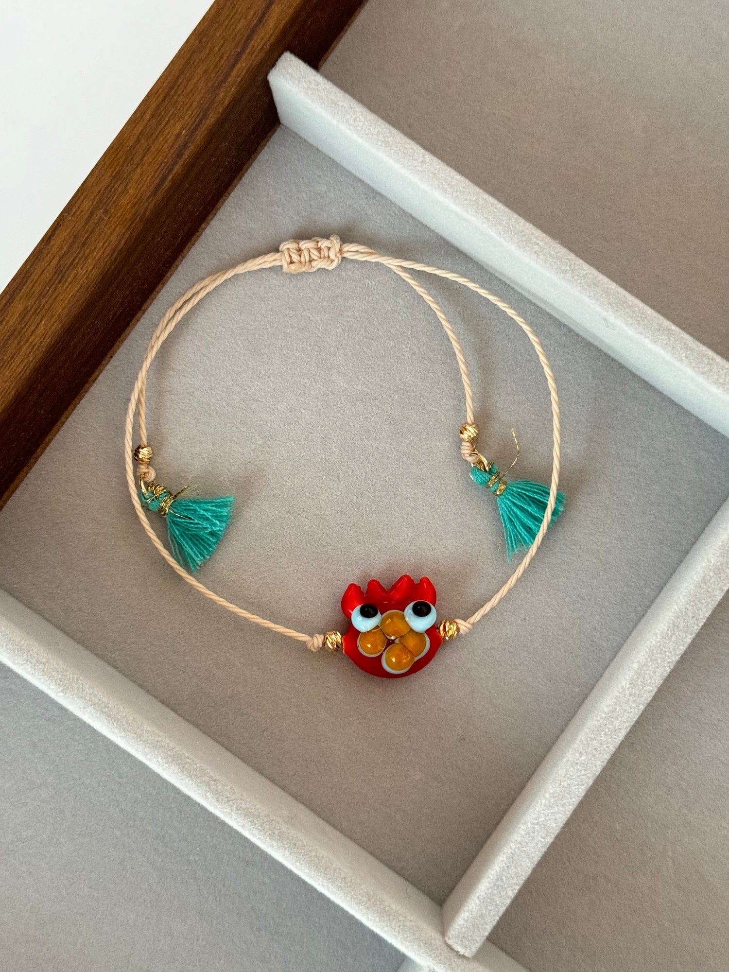 YENGEÇ CAM BONCUK EL YAPIMI İPLİ BİLEKLİK