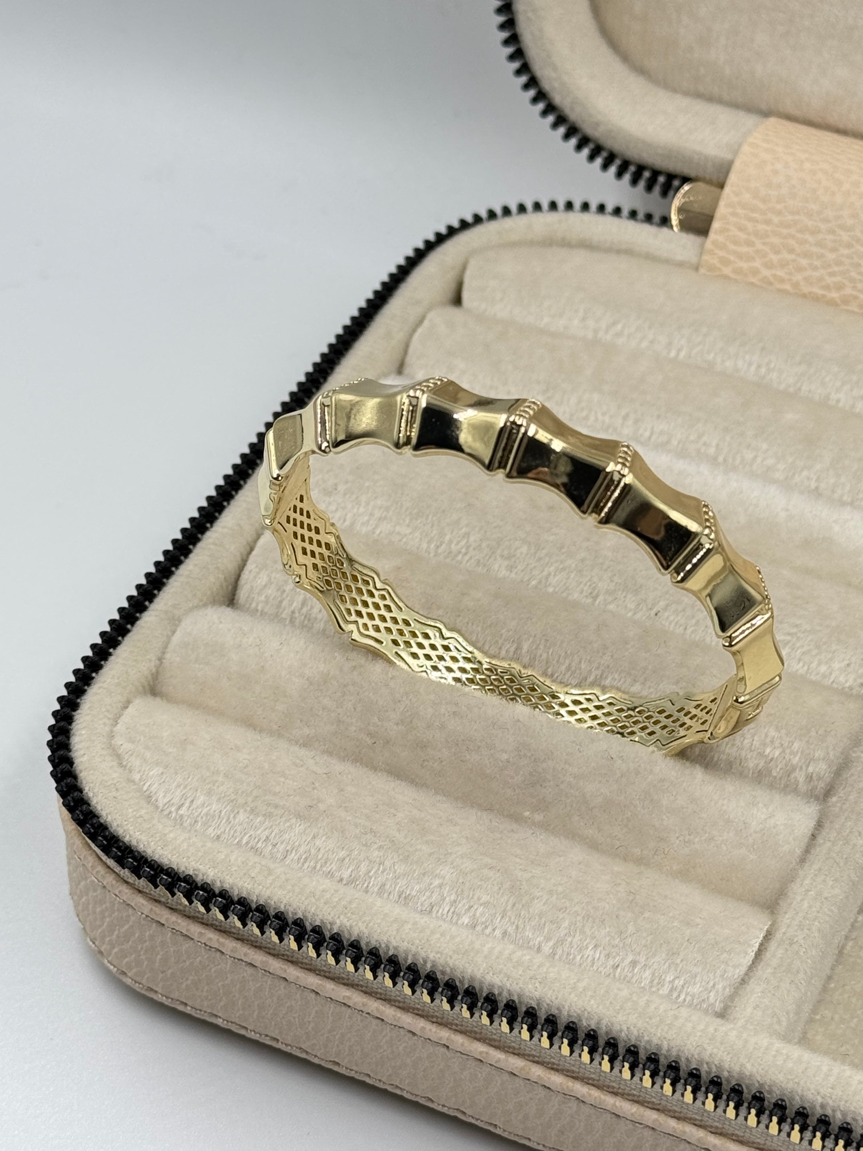 İTHAL KEMİK GÖRÜNÜMLÜ GOLD KELEPÇE BİLEZİK