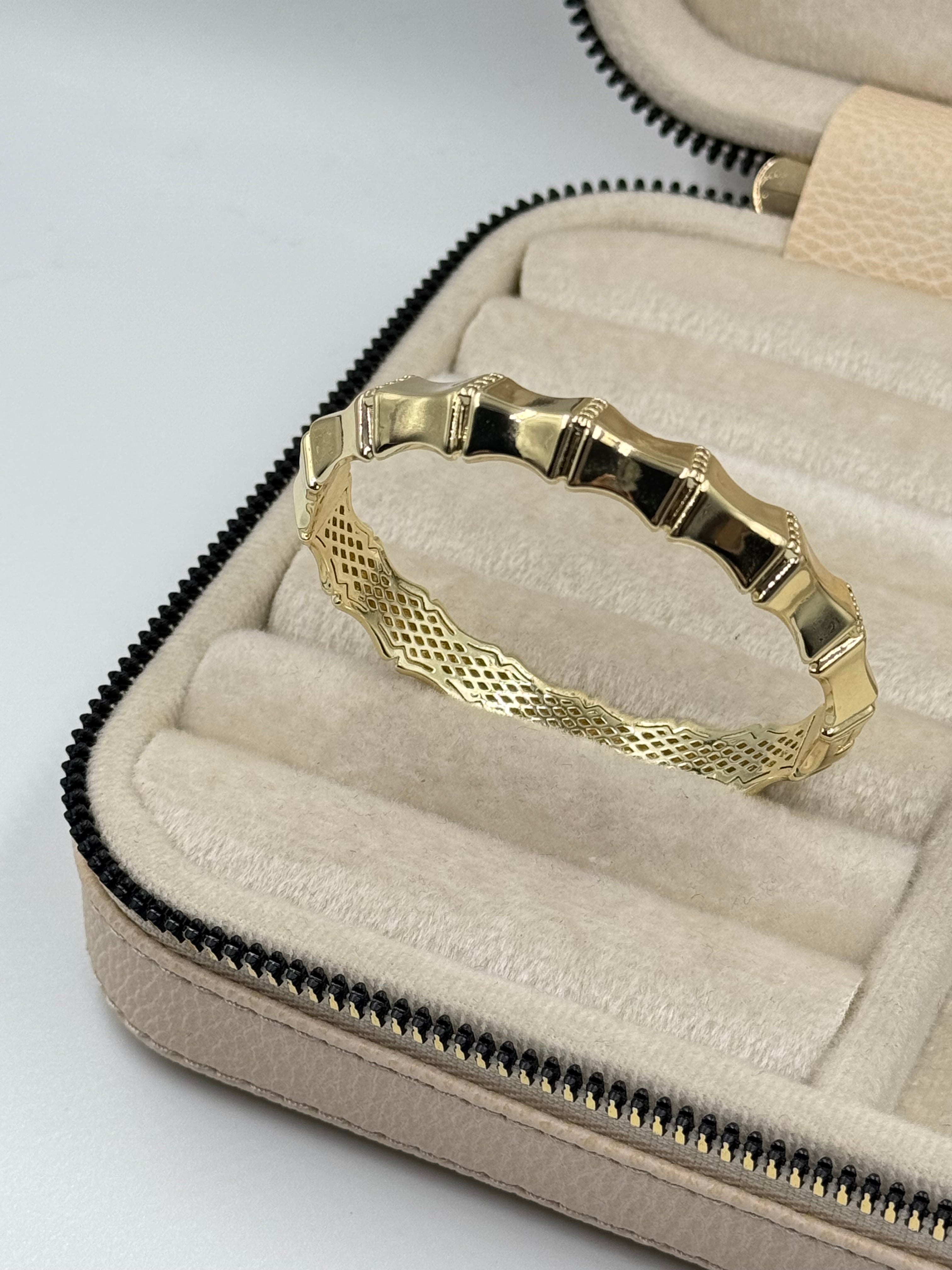 İTHAL KEMİK GÖRÜNÜMLÜ GOLD KELEPÇE BİLEZİK