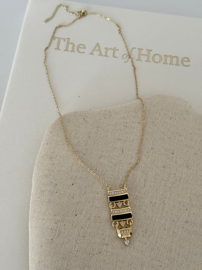 ELAN ANTİK DETAYLI SİYAH MİNE GOLD KOLYE