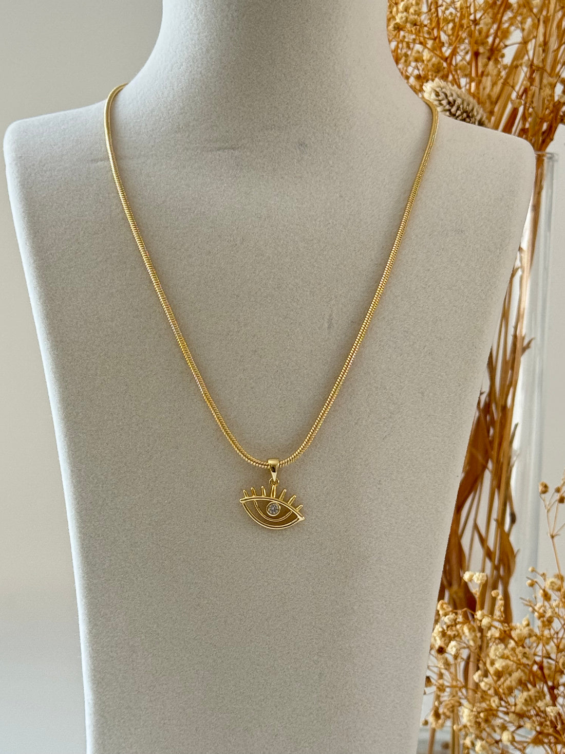 İTHAL GÖZ DETAYLI GOLD KOLYE