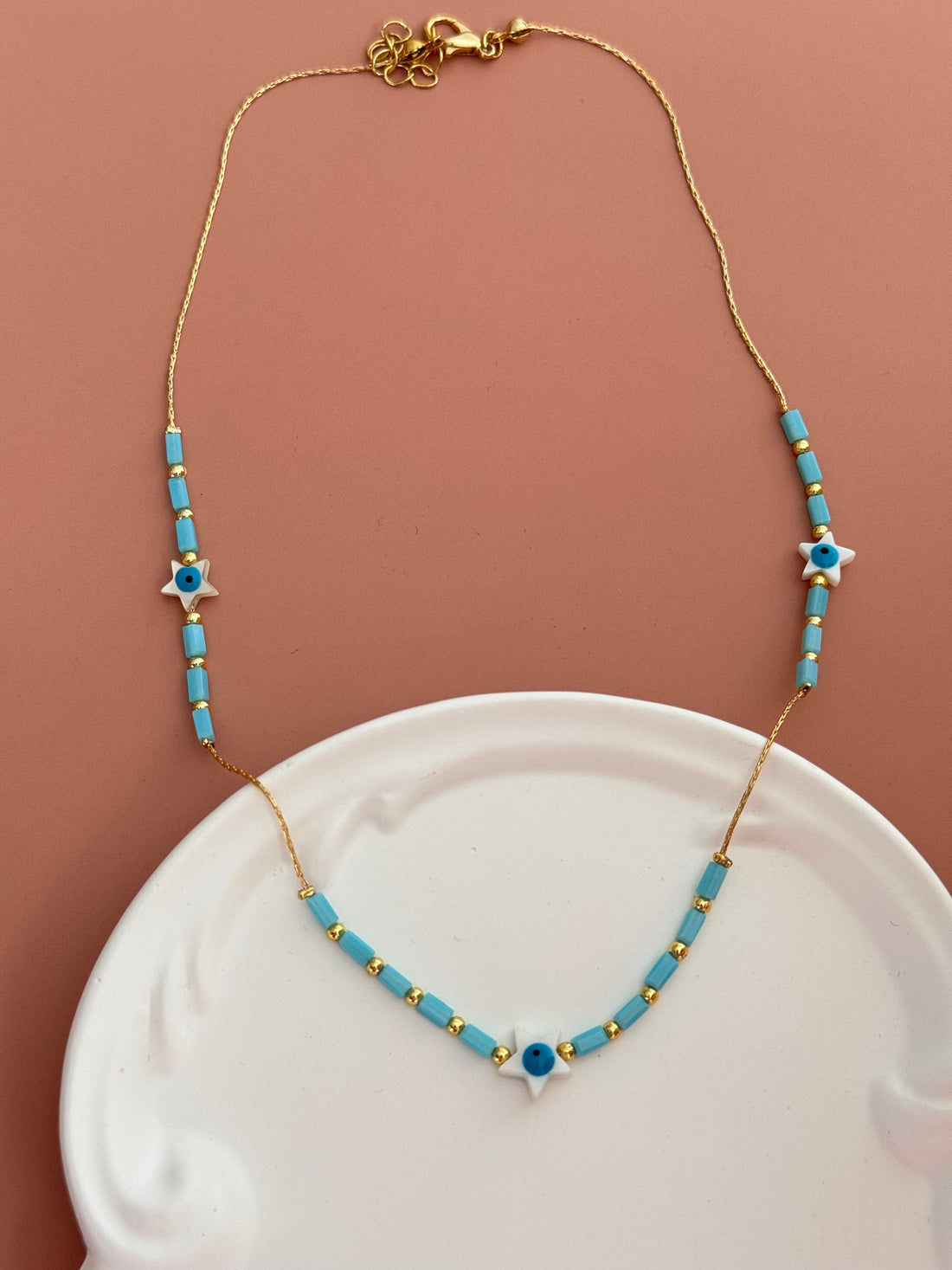 AERİ MAVİ KRİSTAL CAMLI YILDIZ DETAYLI ALTIN KAPLAMA KOLYE