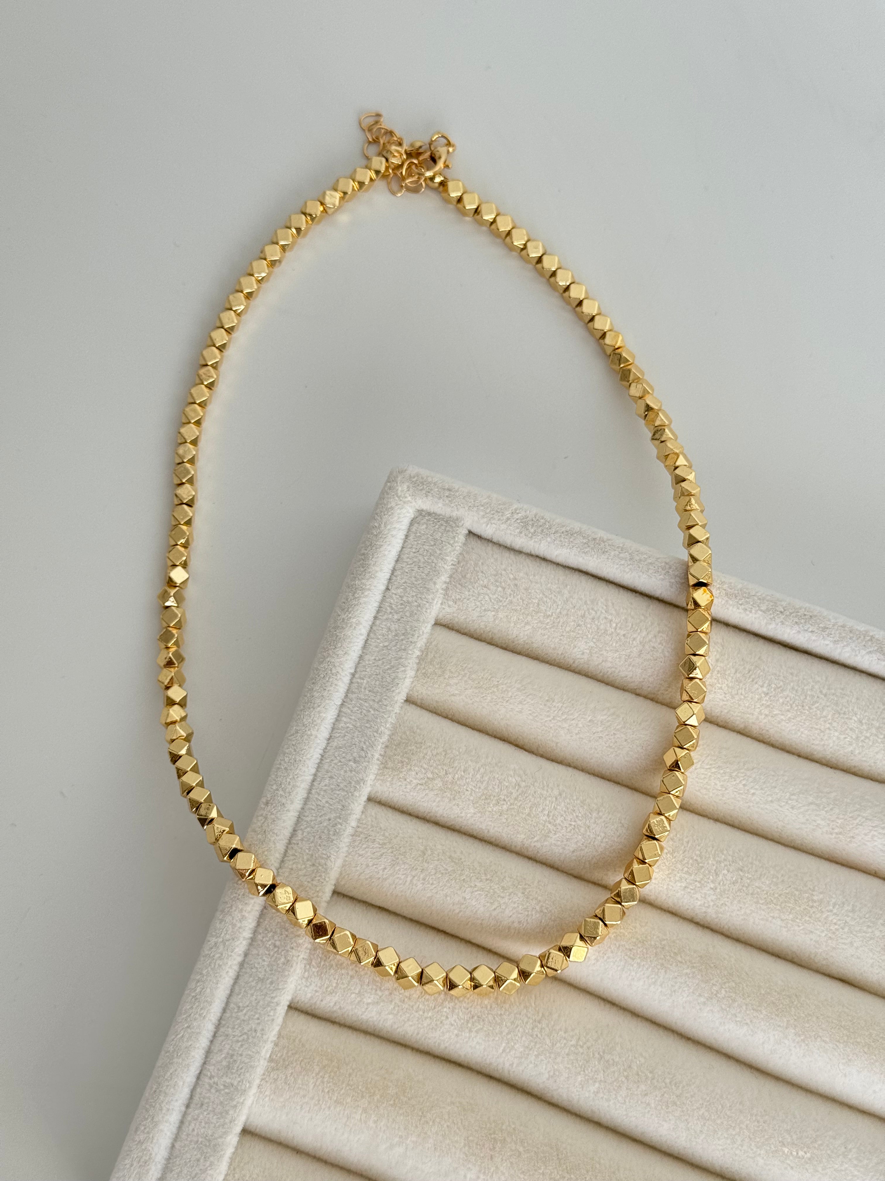 İTHAL KÜP DETAYLI GOLD KOLYE